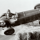 F1's first championship was 1950, but not its first season. Here’s a shot from the 1948 grand prix at Silverstone, one of the early years of Grand Prix racing after the break from WWII. The driver, Geoffrey Ansell, made it out fine even after rolling his ERA.